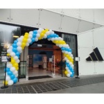 Adidas entrance balloon arch in blue, white and yellow
