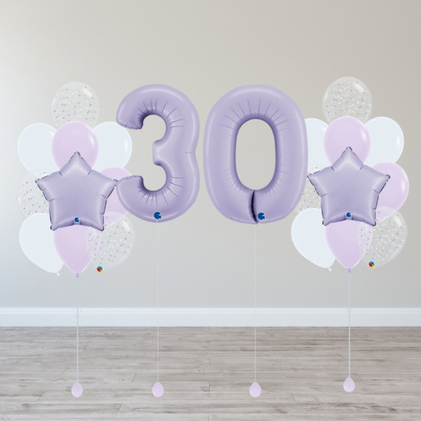 Lavender number balloon package with pastel purple foil age balloons, white and lavender helium balloon bouquets, confetti balloons and star foil balloons for birthday celebrations.