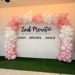 Organic balloon arch for lash monster in pastel pink, white and pink